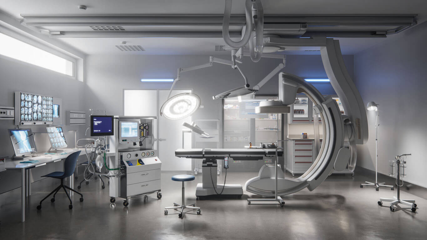 A photo of an empty surgery room filled with various medical equipment and tools. 